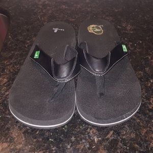 Men’s Sanuk flip flops size 14.